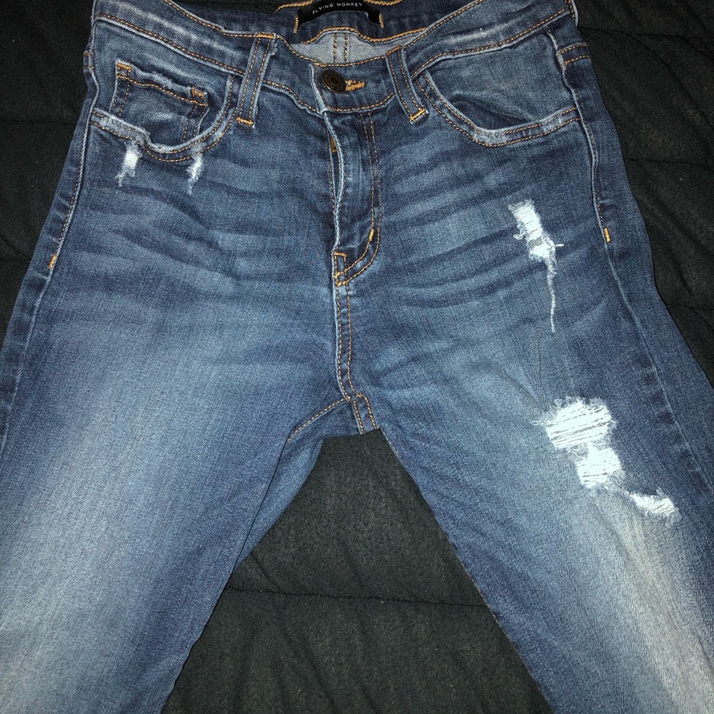Straight legged ripped jeans